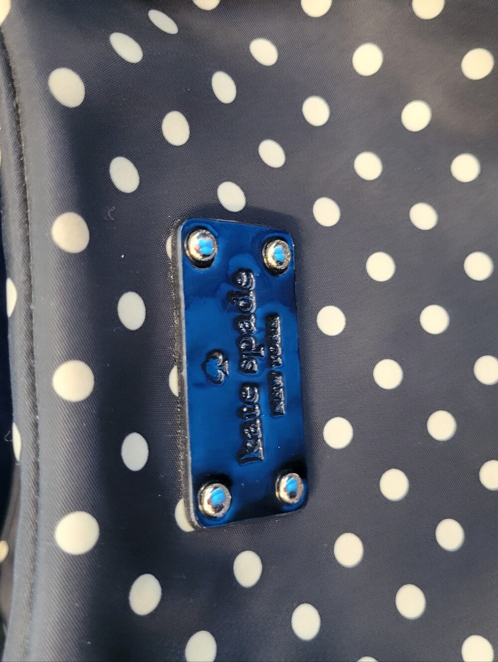 kate spade Blqck and white polka dot handbag with logo plaque